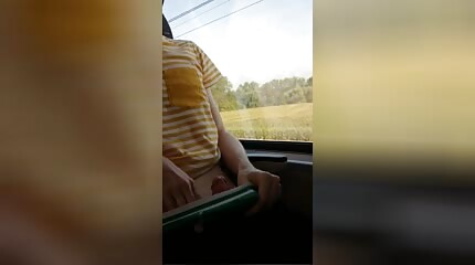 College boy jerks off on the train while another train passes by